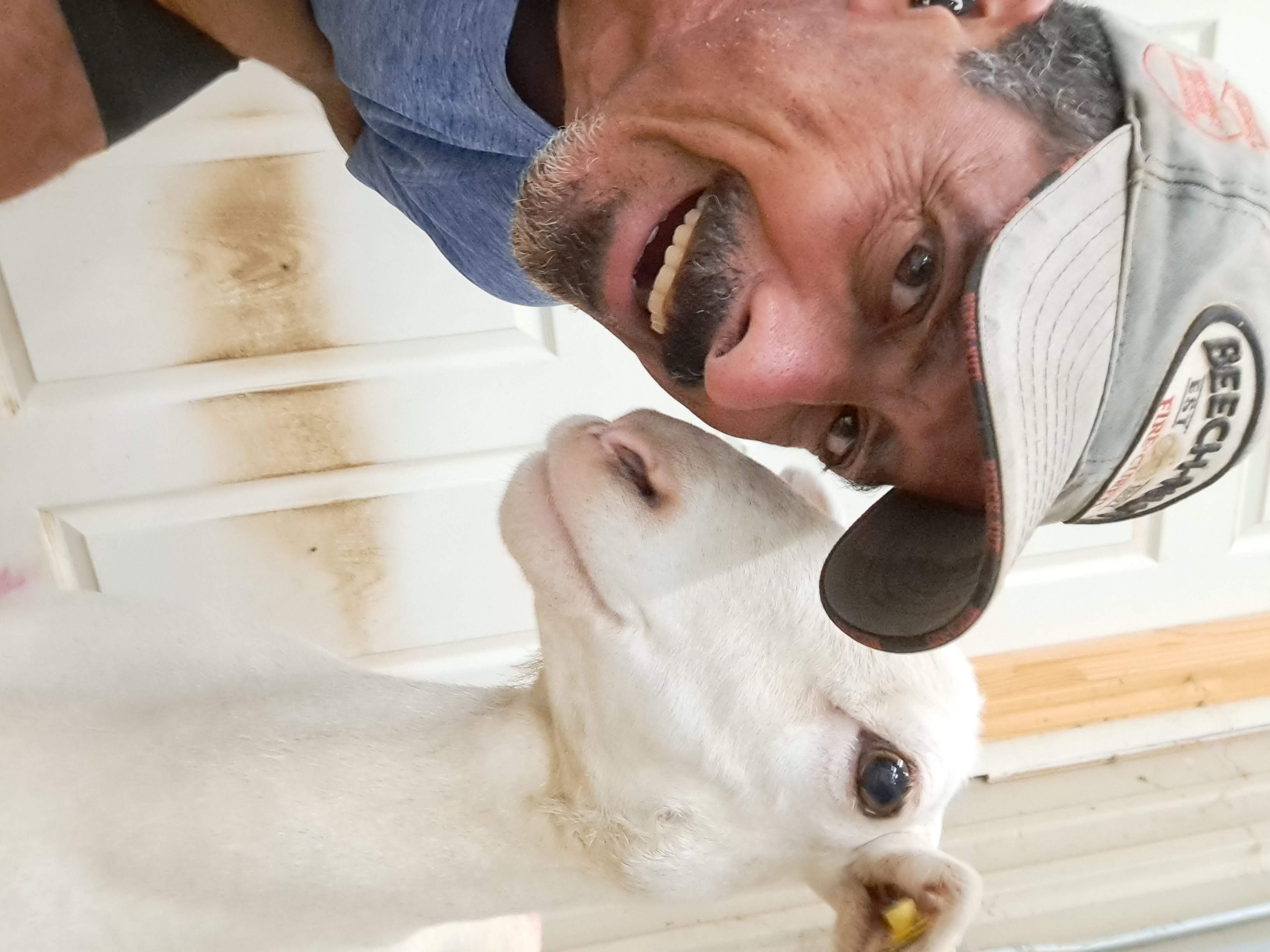 Farmer with a friendly sheep